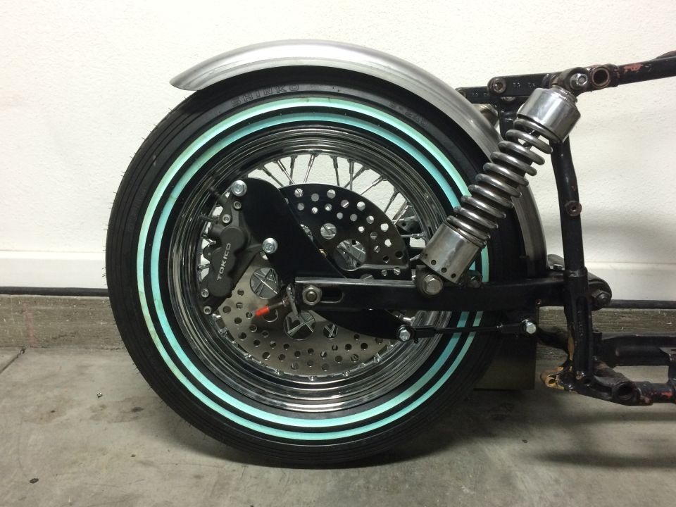 Shovelhead swingarm frame with rear Tokico 6 piston caliper and solid mounted rear fender
