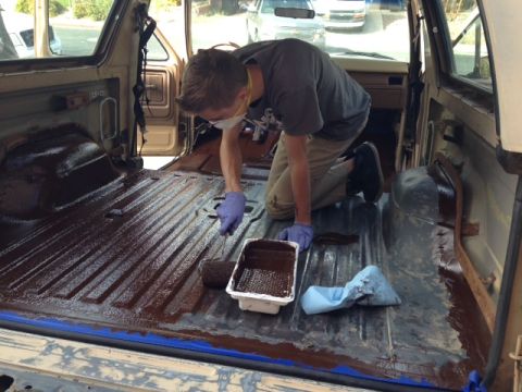 1986 Ford Bronco - My son installing Monstaliner