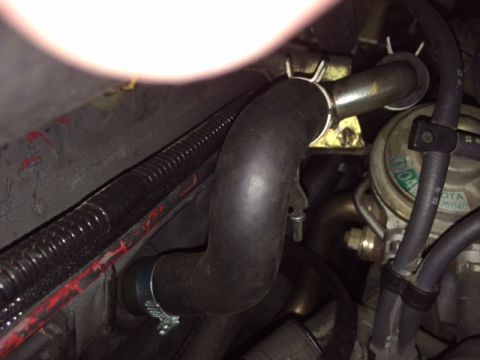 1988 Suzuki Samurai - The engine bay shows a modified engine with various components visible.