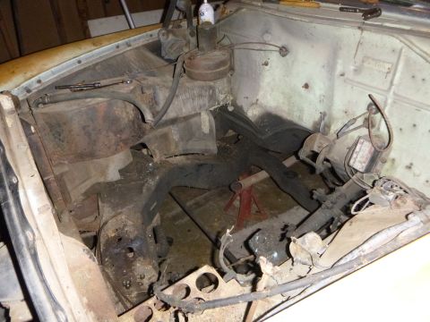 1953 Plymouth Belvedere - Engine bay of a 1953 Plymouth Belvedere, showing the frame and engine mounts.