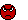 1988 Ford Bronco - A close-up of a red cartoon character's head with white eyes is shown against a solid blue backdrop.