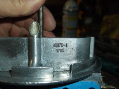 1979 Ford Ranchero - Carburetor part with visible casting numbers 60870-1 and 1209.