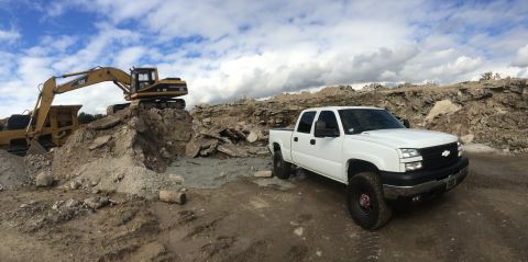 2006 Chevrolet Silverado 2500 - White 2006 Chevrolet Silverado 2500 at a construction site with an excavator.