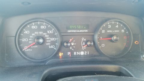 1991 Ford LTD Crown Victoria - Interior view of a vehicle's dashboard, displaying the odometer, speedometer, tachometer, and various warning lights.