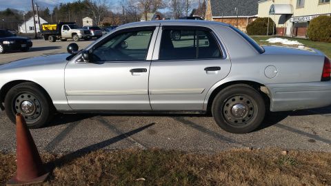 1991 Ford LTD Crown Victoria - This silver sedan has a distinctive body style from the early 2000s.