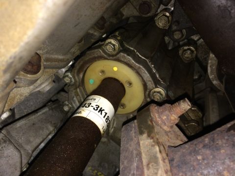 2011 Ford Elite - Close-up view of a driveshaft and PTU seal, with part number 43-3K183 clearly visible on the shaft.
