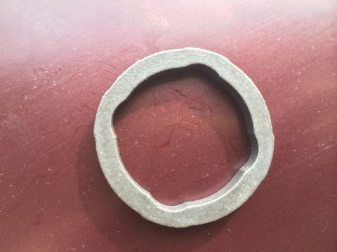 2011 Ford Elite - A rubber gasket is shown against a red background with a Supermotors.net watermark.