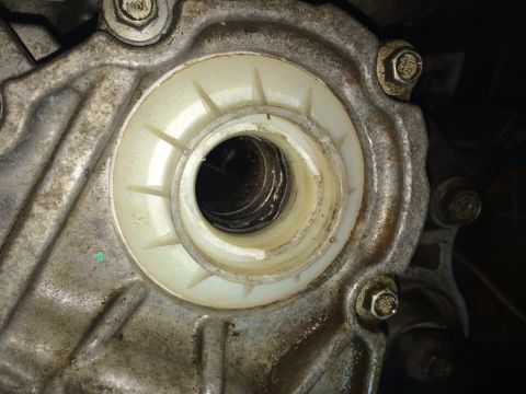 2011 Ford Elite - This image shows a close-up view of a component within a vehicle's transmission system, likely a seal or bearing housing.