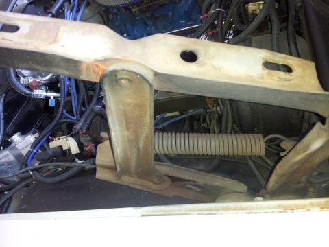 1976 Ford Ranchero - The image shows a detailed view of the engine compartment, focusing on mechanical parts and electrical components.