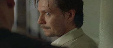2000 Mercury Grand Marquis - Close-up of a man's face with stubble and a mustache.