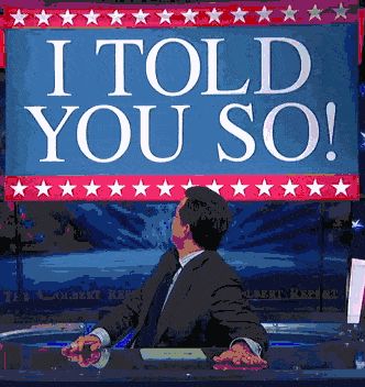 2000 Mercury Grand Marquis - A television screen displays the text "I TOLD YOU SO!" with a person visible from behind.
