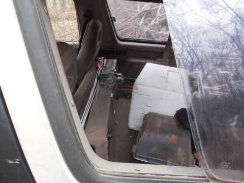 1983 Ford Bronco - Jerking on that tree caused some cargo shifting... Eventually, the seat even flopped back.