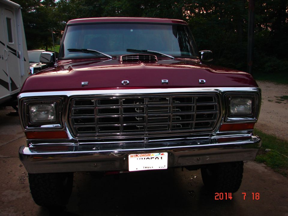 1979 Ford F-150 pickup truck, front view, dark red, chrome grille and bumper, Wisconsin license plate