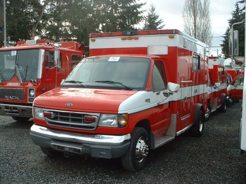 1999 Ford Crown Victoria - Retired '97 Seattle Fire Department E-250 Ambulance. 5 of them were at the auction lot.