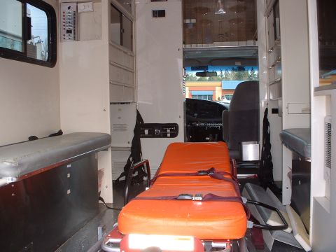 1999 Ford Crown Victoria - Interior view of an ambulance, showing medical equipment and seating.