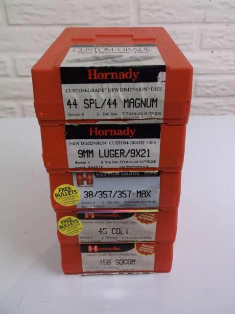 1995 Mercury Grand Marquis - This image shows a stack of Hornady custom-grade new dimension dies for various calibers, including 44 Magnum, 9mm Luger, 38/357 Max, 45 Co…