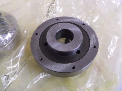 1995 Mercury Grand Marquis - A metal part, possibly a pulley or hub, is shown in its protective packaging.