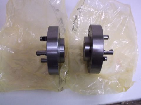 1995 Mercury Grand Marquis - Two metal automotive parts are shown packaged in plastic, with a Supermotors.net logo visible at the bottom right.