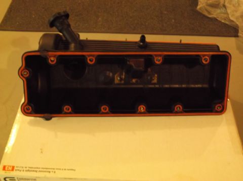 1995 Mercury Grand Marquis - Engine valve cover with orange gasket and black cap is shown.