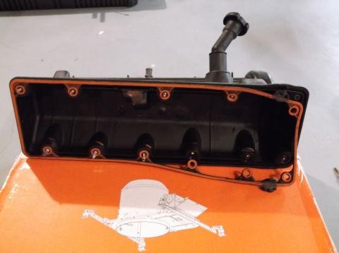 1995 Mercury Grand Marquis - A valve cover gasket is shown on a box, with a diagram and website logo visible.