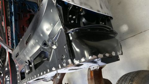 1970 Pontiac Trans Am - The front fender well and inner structure of a 1970 Pontiac Trans Am are shown during a restoration process.