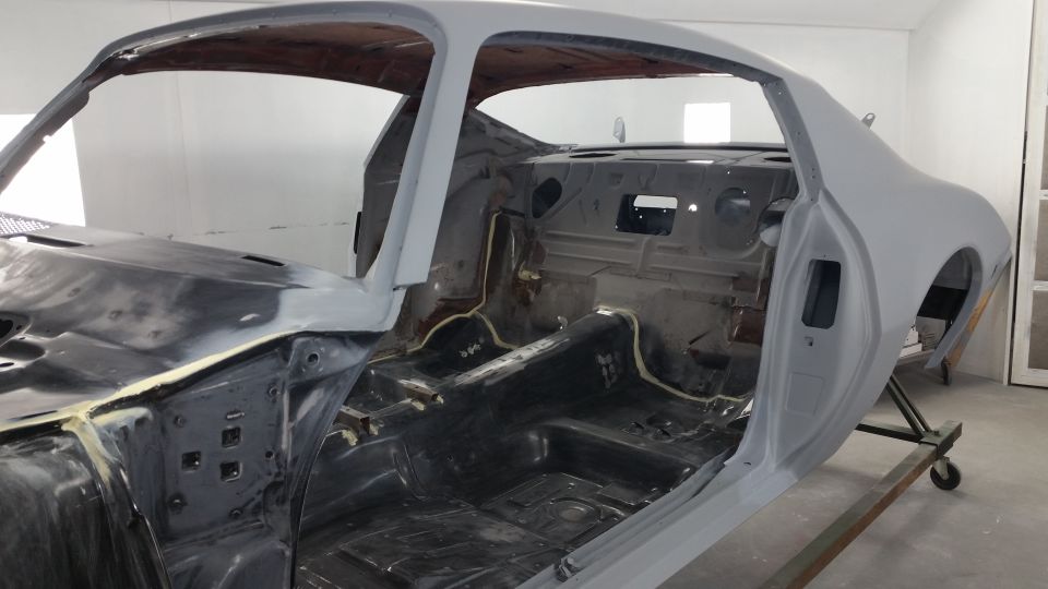 1970 Pontiac Trans Am interior and body shell in primer, undergoing restoration