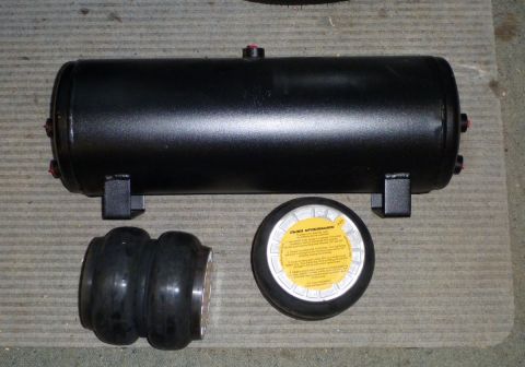 1964 Mercury Monterey - Air suspension tank and components shown on a textured surface.