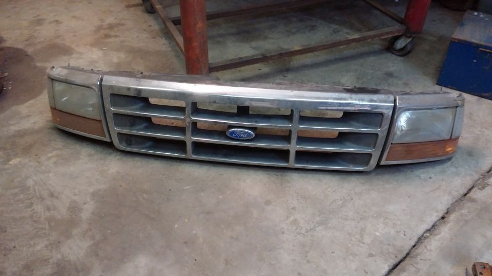Ford Bronco front grille with headlights and Ford logo