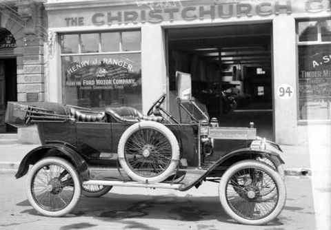 1914 Ford Model T - A 1914 Ford Model T touring car is seen parked outside the Henry J. Ranger Ford Motor Company dealership.