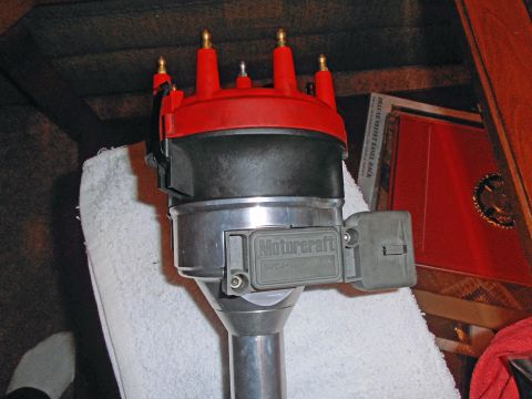 1990 Ford Bronco - A Motorcraft distributor part is shown, with readable text on its housing.