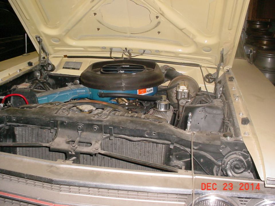 1971 Ford Ranchero engine bay, tan exterior, close-up of engine components