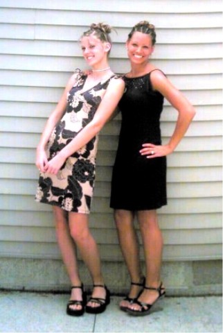 1997 Ford Taurus - Two women pose for a photo in front of a light-colored, horizontally paneled wall.