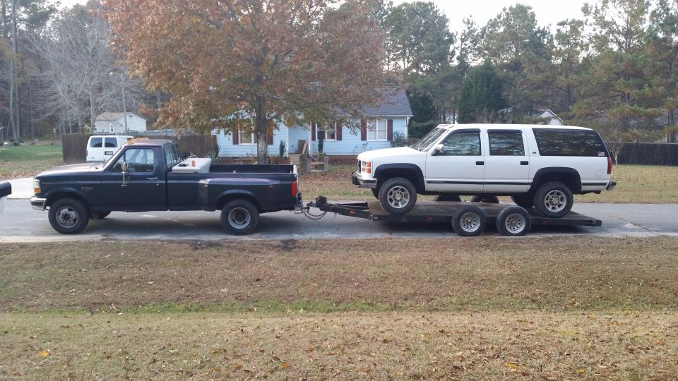 Balancer finally separated; picking it up after ditching it at a friends house. Tow rig is an all original 93 IDI turbo 5 speed. I had just pulled the Suburban on the trailer so the suspension on the dually had not settled yet; that's why it looks nose high in case you were wondering.