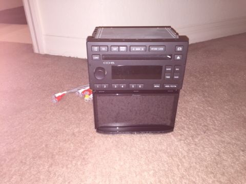2007 Ford Crown Victoria - Side by Side comparison of Stock Radio with a Pioneer AVIC-8000NEX