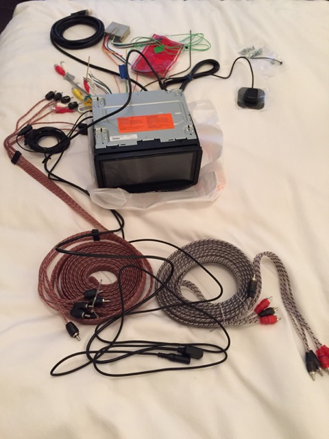 2007 Ford Crown Victoria - Getting ready for installation of the Pioneer AVIC-8000NEX RCA cables are called "Stingers" and they are flat and very easy to in…