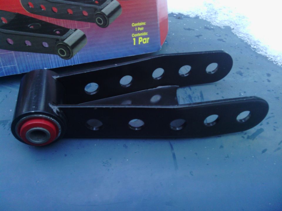 Black rear leaf spring shackles with red bushings