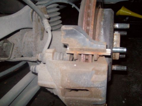 2004 Ford Crown Victoria - Caliper showing the ages of time.