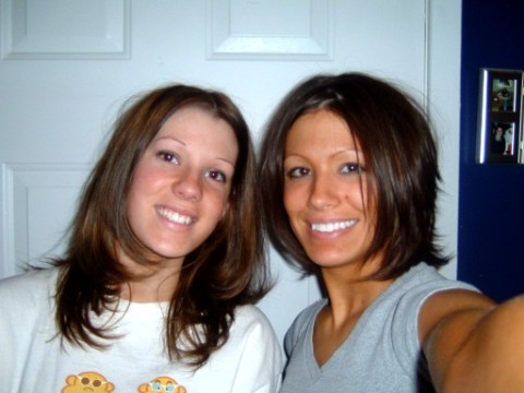 1997 Ford Taurus - Two women smile for a selfie, with a SUPERMOTORS watermark visible.