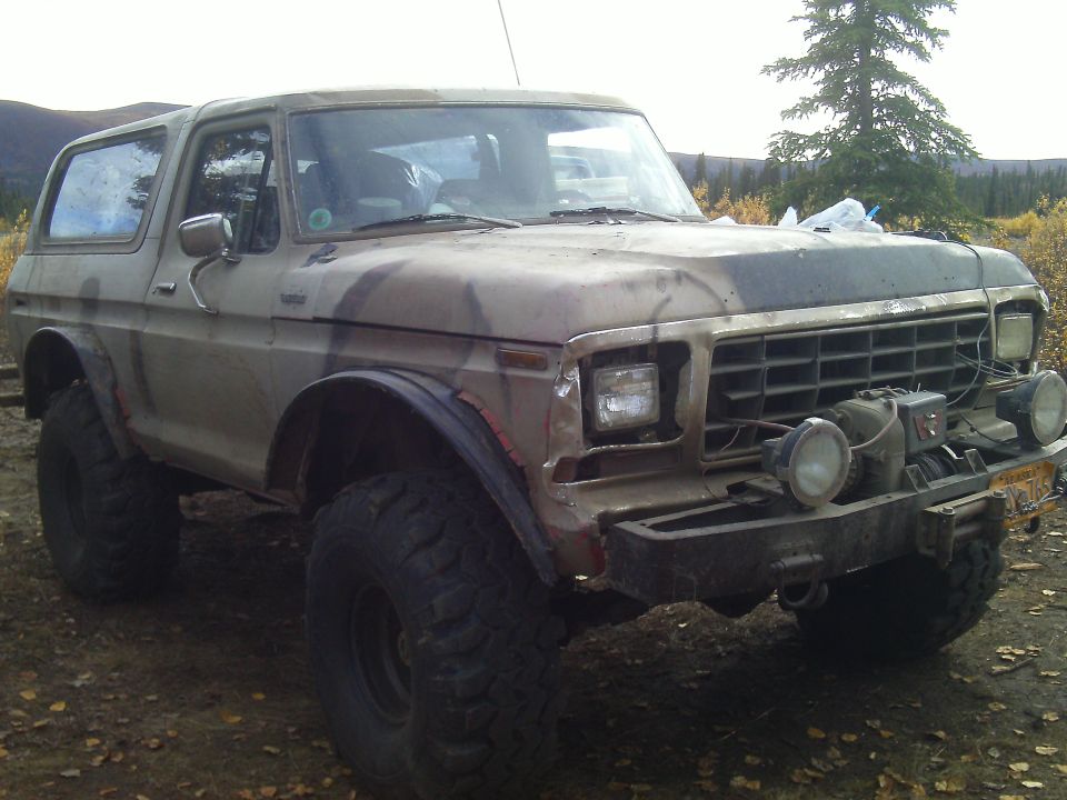 1978 Ford Bronco with camouflage paint and off-road tires