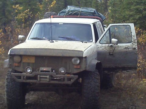 1990 Ford F-250 - This heavily modified pickup truck appears to be from the 1980s, not the 1990s as claimed.