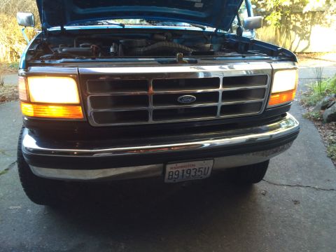 1990 Ford Bronco - Front view of a 1992 Ford F-150 pickup truck with the hood open.