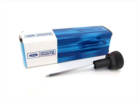 1990 Ford Bronco - Ford Genuine Parts box with a headlight switch knob and shaft.