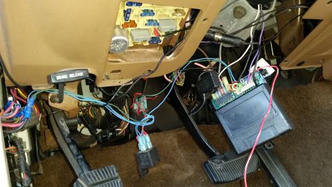 1991 Ford F-250 - The fuse box and brake release lever are visible in this interior shot of a 1991 Ford F-250.