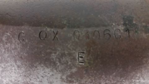 1970 Pontiac Trans Am - Close-up of a part showing stamped identification numbers C OX 0306C1 and E.