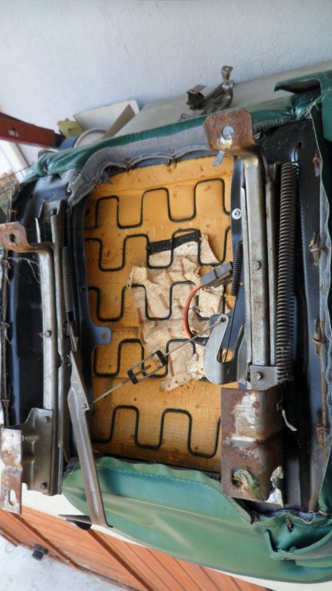 1972 Ford Ranchero - Interior view of a green car seat, showing the internal springs and foam padding.