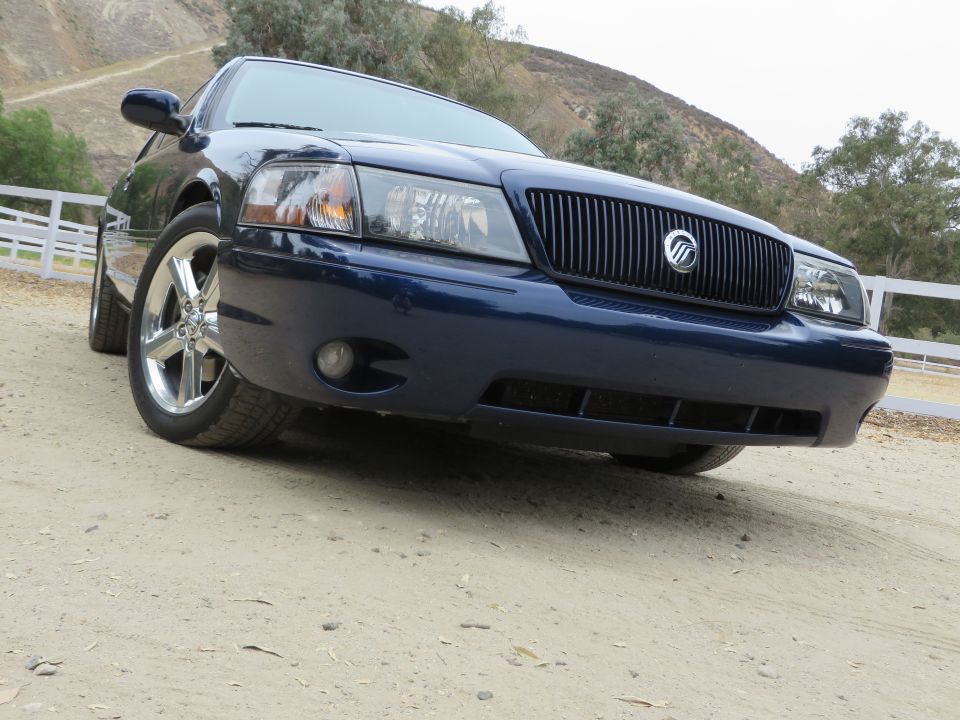 2003 Mercury Marauder front grille and headlights, dark blue paint, chrome wheels