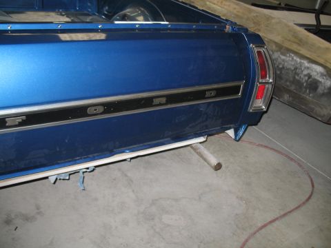 1972 Ford Ranchero - The rear of a blue Ford Ranchero shows its distinctive body style and chrome trim.