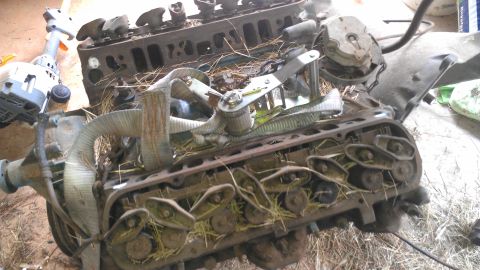 1970 Pontiac Trans Am - This is a disassembled engine block with straw and straps, not a complete vehicle.