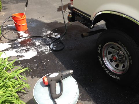 1989 Ford Bronco - Heat gun to losen the trim from the body panel. Remember not to overheat one spot. Keep heater moving and use a plastic scraper to remove t…