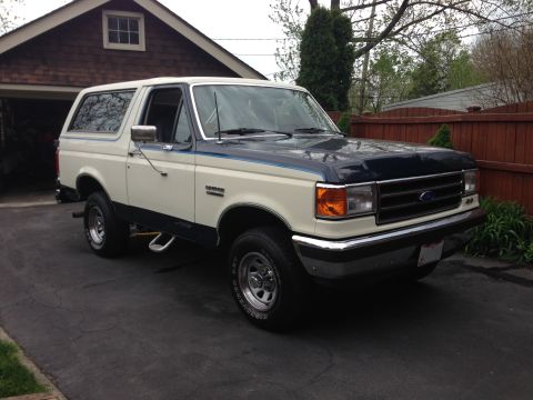 1989 Ford Bronco - Post-mod (if you can call it that). I think it looks cleaner. Less cluttered.